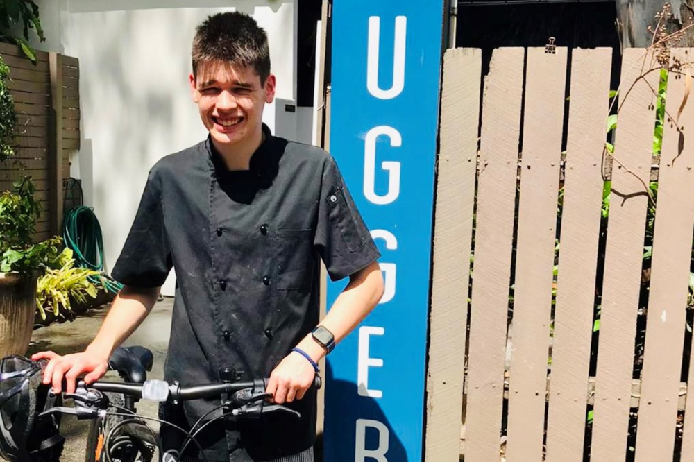 Max with bike at Ruggers